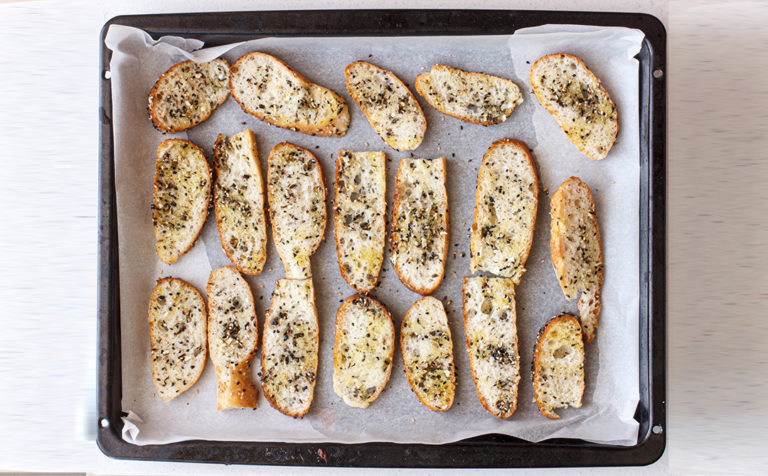 توست كروستيني Crostini Toasts with Toasted Seeds going into the oven
